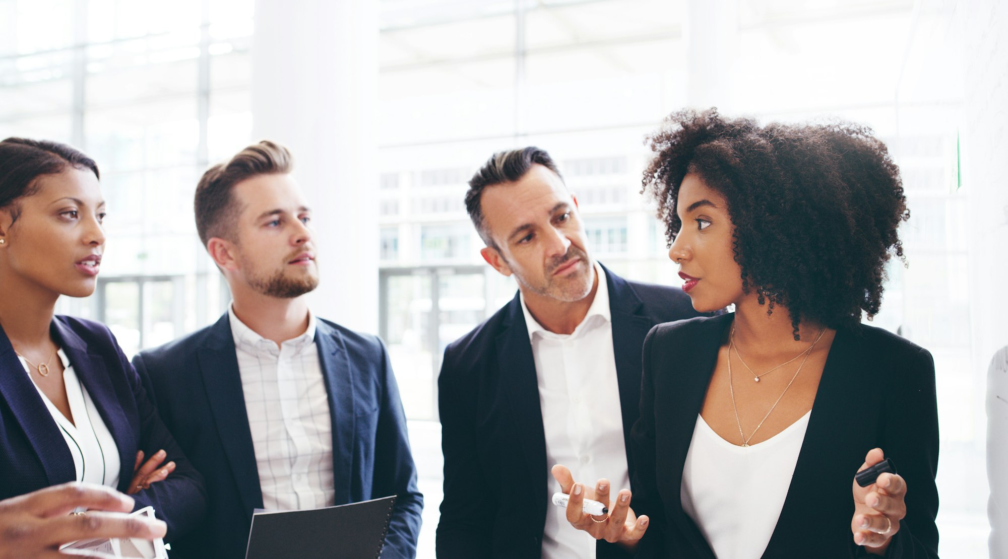 Shot of a group of businesspeople having a brainstorming session in a modern office